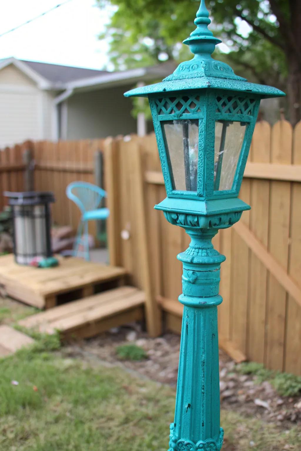 Illuminate your space with a striking teal transformation: the art of painting your lamp post.
