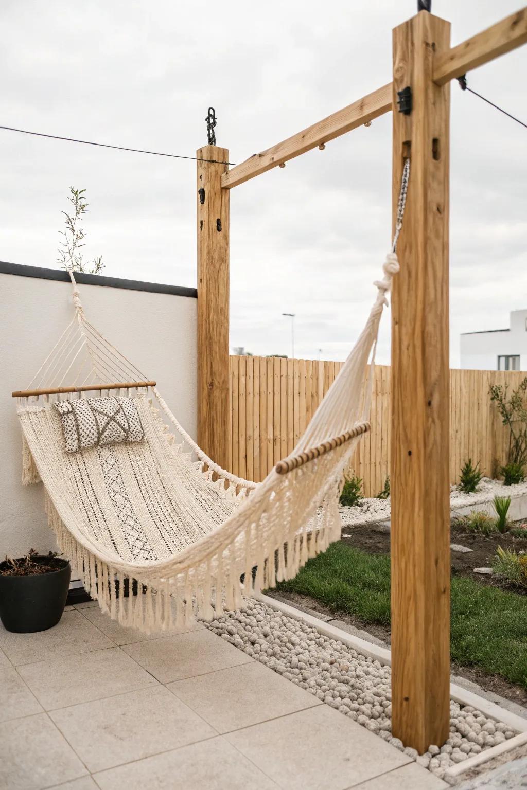 Find serenity in your backyard with a hammock elegantly supported by rustic fence posts. Embrace the blend of minimalist and boho aesthetics.