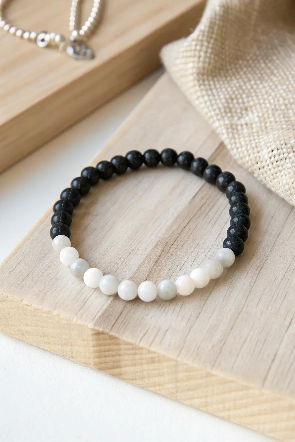 Discover the elegance of monochrome magic with this gradient pony bead bracelet, perfect for adding a touch of sophistication to any occasion.