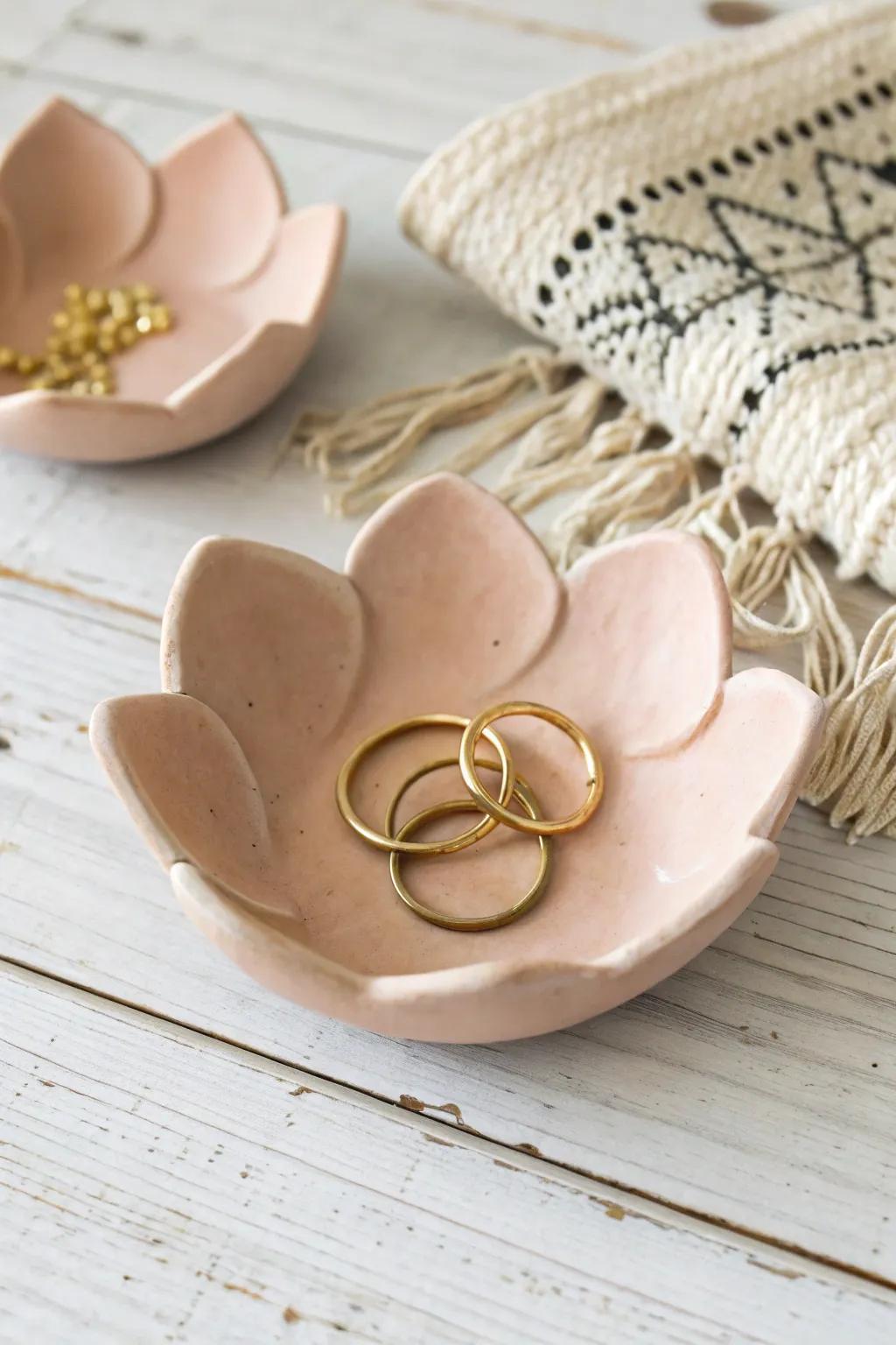 Elegantly simple: Keep your treasures organized with a handcrafted clay jewelry dish that blends Scandinavian minimalism with boho charm.