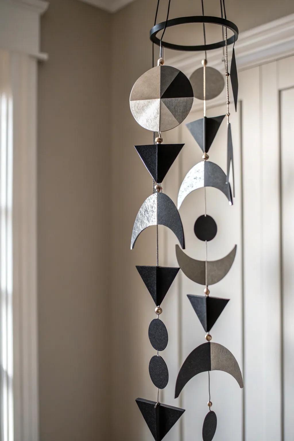 Elevate your space with kinetic art: a sleek sculptural mobile in motion.