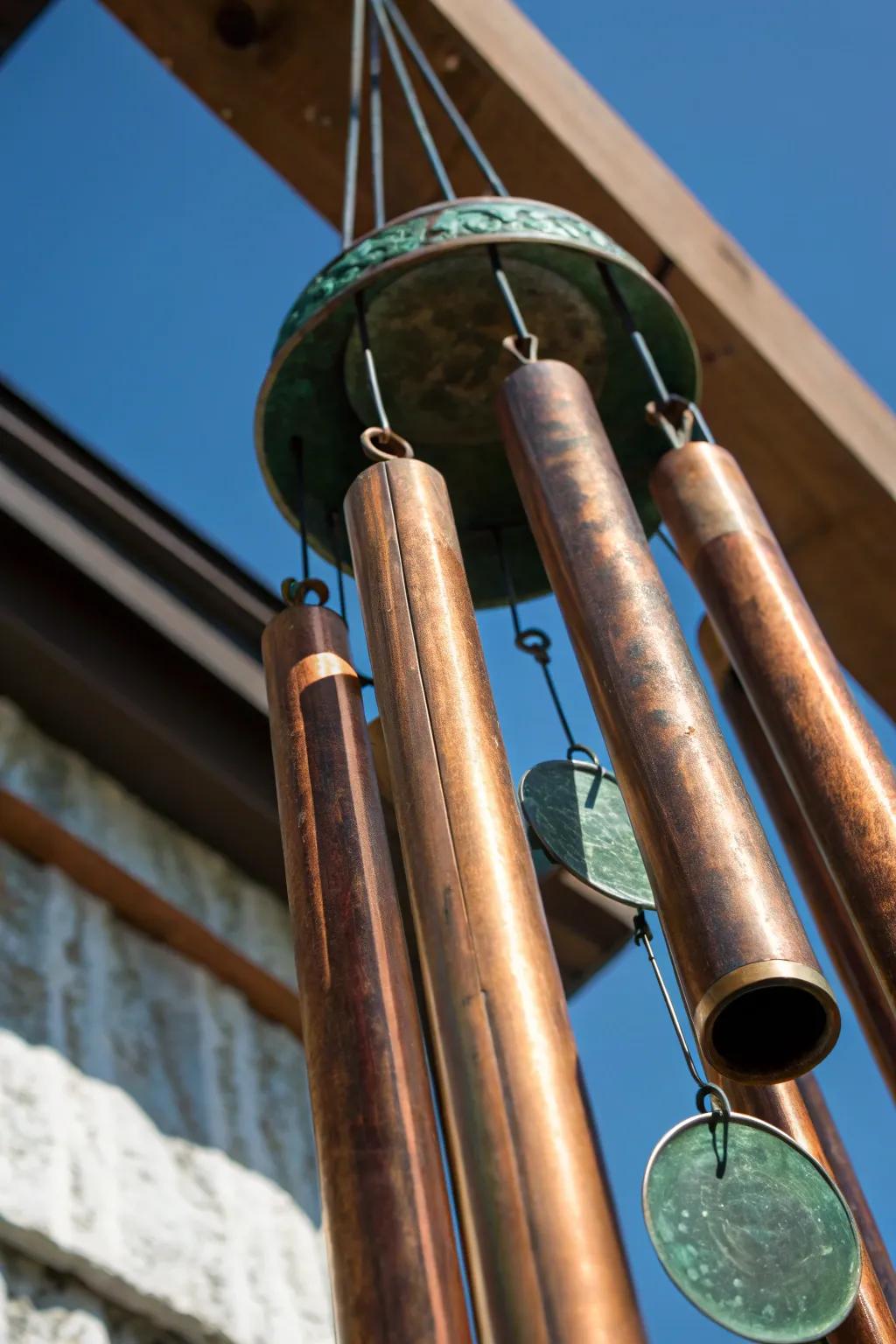 Transform scrap into song: Discover the art of crafting wind chimes from recycled copper.